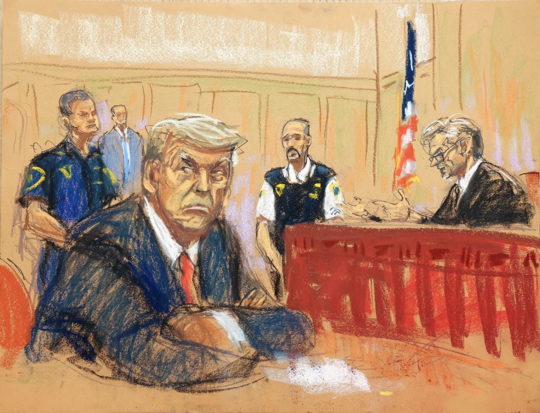 Former U.S. President Donald Trump appears in court for an arraignment on charges stemming from his indictment by a Manhattan grand jury following a probe into hush money paid to porn star Stormy Daniels, in New York City, U.S., April 4, 2023, in this courtroom sketch.  REUTERS/Jane Rosenberg
