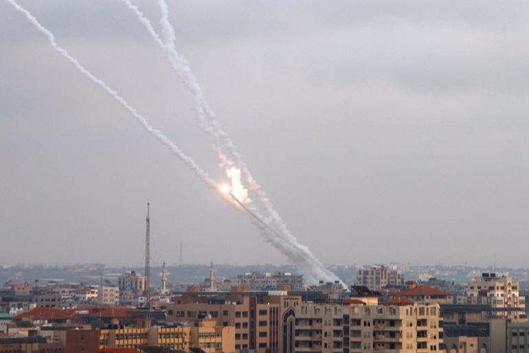 Rockets are fired from Gaza into Israel, in Gaza