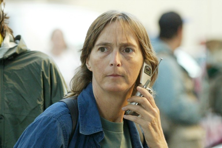 Peace activist Lisa Fithian is shown near demonstrations against meetings of the Free Trade Area of the Americas in Miami, November 20, 2003 Law enforcement agencies expect thousands of demonstrators to protest against the FTAA. REUTERS/Shannon Stapleton JLS