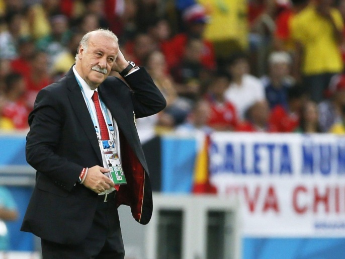 Spain's head coach Vicente del Bosque reacts during the FIFA World Cup 2014 group B preliminary round match between Spain and Chile at the Estadio do Maracana in Rio de Janeiro, Brazil, 18 June 2014. (RESTRICTIONS APPLY: Editorial Use Only, not used in association with any commercial entity - Images must not be used in any form of alert service or push service of any kind including via mobile alert services, downloads to mobile devices or MMS messaging - Images must appear as still images and must not emulate match action video footage - No alteration is made to, and no text or image is superimposed over, any published image which: (a) intentionally obscures or removes a sponsor identification image; or (b) adds or overlays the commercial identification of any third party which is not officially associated with the FIFA World Cup) EPA/JUANJO MARTIN