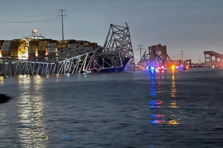 A view of the Singapore-flagged container ship 'Dali' after it collided with a pillar of the Francis Scott Key Bridge in Baltimore, Maryland, U.S., in this picture released on March 26, 2024. Harford County MD Fire & EMS/Handout via REUTERS THIS IMAGE HAS BEEN SUPPLIED BY A THIRD PARTY NO RESALES. NO ARCHIVES MANDATORY CREDIT